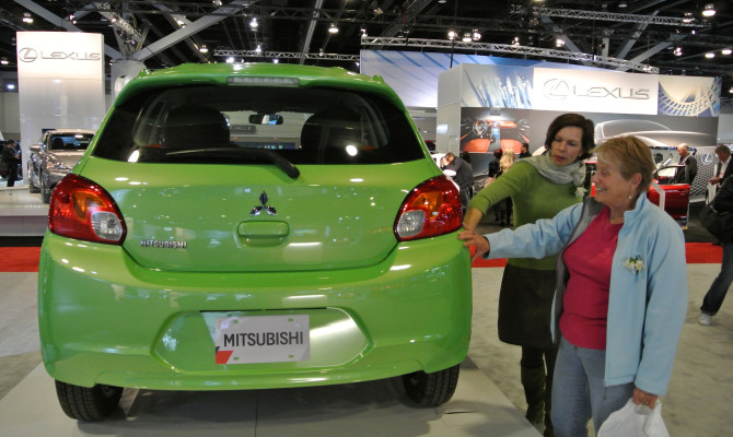 Anki Kervinen (left) and Louise Long (right) check out the new Mitsubishi Mirage subcompact (Photo: Alexandra Straub)