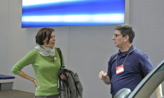 Anki Kervinen chats with Auto Show representatives about purchasing a new vehicle (Photo: Alexandra Straub)