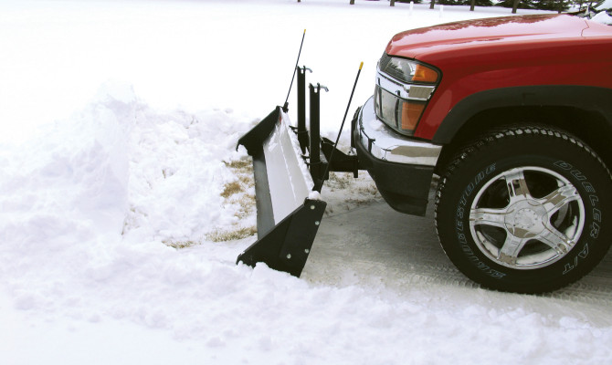 GMC backing up after a nice plow.